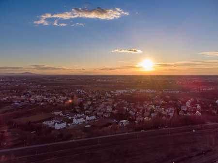 Drone shot small European city in spring sunset. Aerial top view of outskirts of Wroclaw, Poland.の写真素材