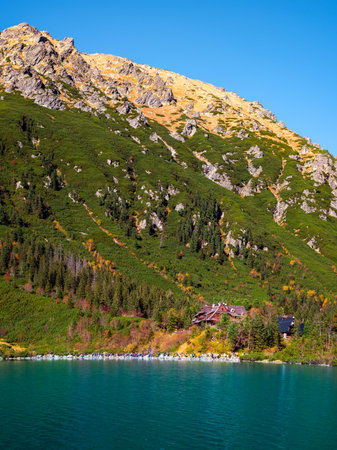 Tatra National Park, Poland. Mountains lake Morskie Oko Or Eye of the Sea In autumn. Beautiful Tatras Landscape. Morskie Oko Shelter in High Tatras.の写真素材