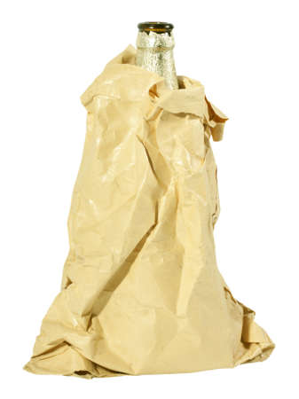 beer bottle hidden in a bag isolated on white backgroundの写真素材
