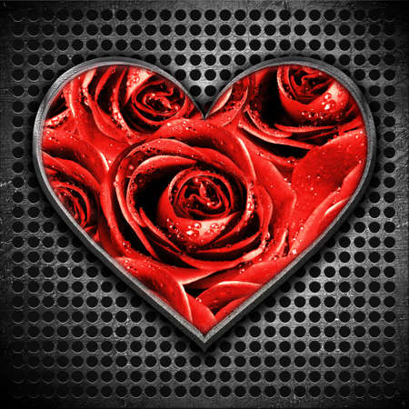Metal heart on a metal backgroundの写真素材