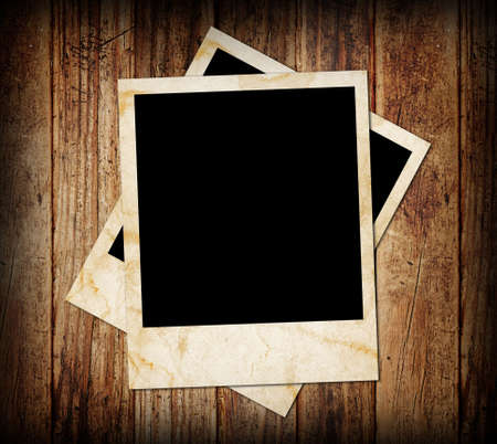 wood background with photo frameの写真素材