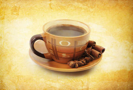 coffe on vintage background with cinnamonの写真素材