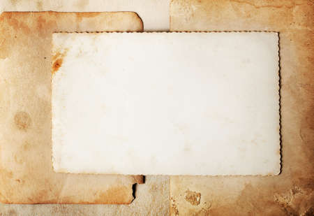 Stack old papers on grunge backgroundの写真素材