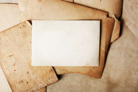 Stack old papers on grunge backgroundの写真素材