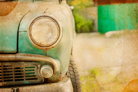 Picture of a old car on grungeの写真素材