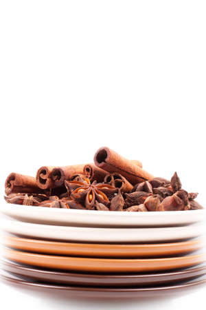 cinnamon on a plate isolated on whiteの写真素材