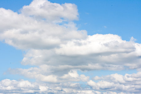 blue sky is covered by white clouds