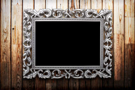 frame on a wooden backgroundの写真素材