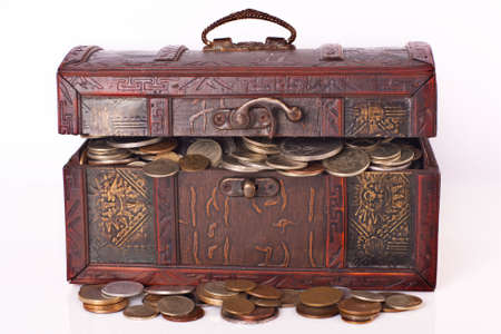 Wooden chest with coins insideの写真素材