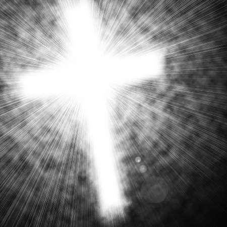 glowing cross in skyの写真素材