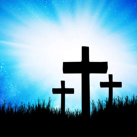 dark cross against a blue skyの写真素材