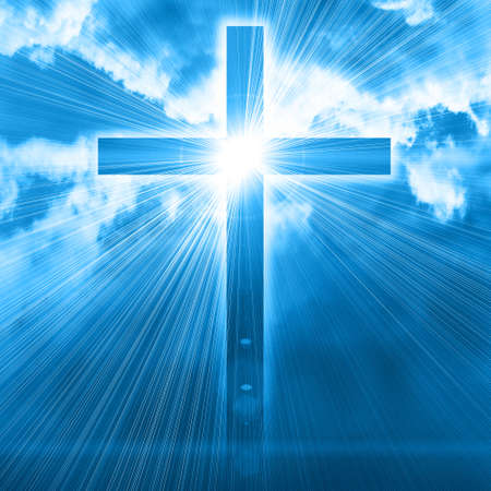glowing cross in skyの写真素材
