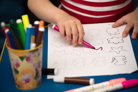 Children's drawing on a white paperの写真素材