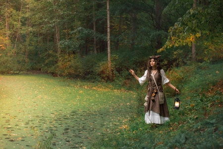 a young witch in an autumn forest