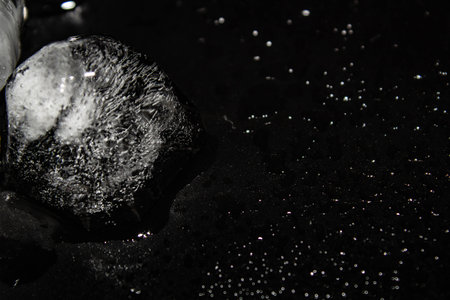 Natural ice cubes on black background, isolated on black. Included clipping path for each...