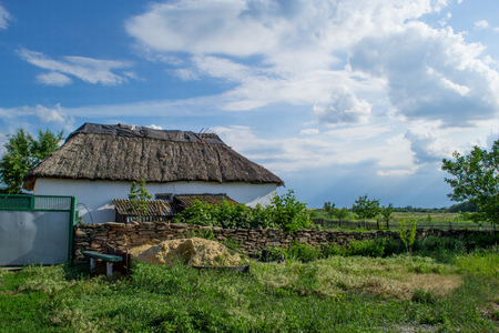 House in the village with thatched roofの写真素材
