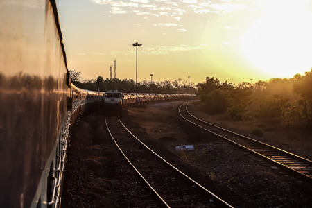 Sunset view from the train window, Indian Railwaysの写真素材
