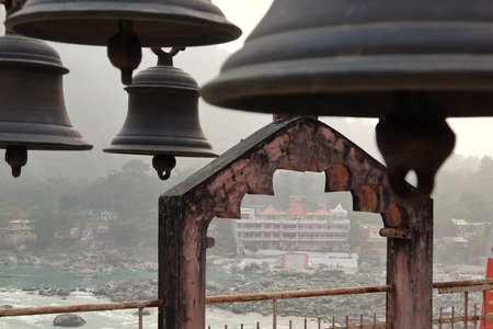 Rishikesh, India - November, 2nd, 2017. View of the bells in the hinduist temple Shri Makar Vahani Ganga Jee and Sita Ram Dham Ashram on the riverbank of Ganga in Rishikeshのeditorial素材