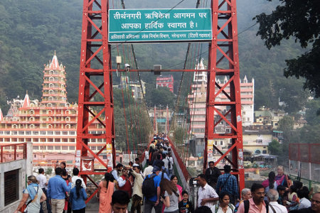 Rishikesh, India - November, 2nd, 2017. Lakshman Jhula bridge and Tera Manzil Temple, Trayambakeshwar in Rishikeshのeditorial素材