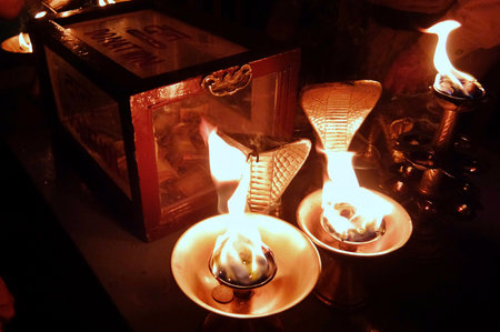 Rishikesh, India - November, 4th, 2017. View of the donation box at Ganga Aarti ceremony in Parmarth Niketan ashram at sunsetのeditorial素材