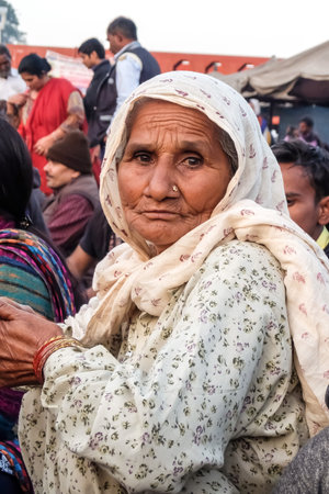 Haridwar, India - December, 11th, 2016. Portrait of an old woman at Ganga Aarti in Haridwarのeditorial素材