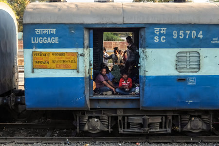 Jalgaon, India - December, 13th, 2016. Passengers in luggage coachのeditorial素材
