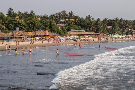 Arambol, Goa, India - February, 17th, 2017. Fishermen on the Arambol beachのeditorial素材