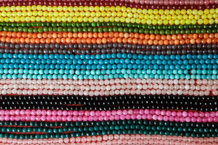 Indian traditional handicraft (glassbeads) on the street market, Arambol, Goa, Indiaの写真素材