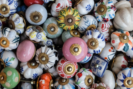 Closeup view of vintage ceramic handles on the street market, Arambol, Goa, Indiaの写真素材