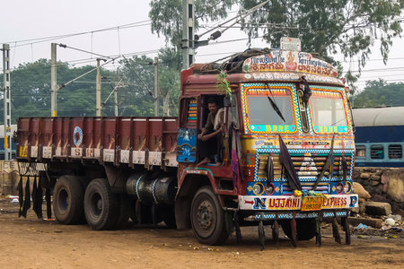 Vijayawada, India - Circa January, 2018. Colorful cargo truck with rich decorative paintings, typical for the trucks in India.のeditorial素材