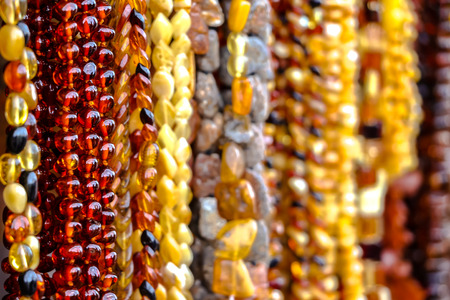 Amber beads of various colors for sale on the street market, Trakai, Lithuania.の写真素材