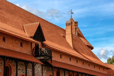 Trakai, Lithuania - Circa August, 2018. View of Trakai castle in sunny day, lake Galve, Lithuania. Details of architecture.のeditorial素材