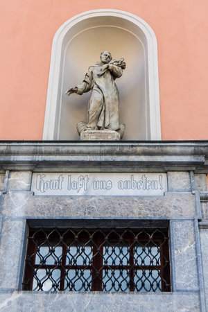 Frohnleiten, Austria - August, 14th, 2017. View of the sculpture on facade of the old Catholic church in Frohnleiten.のeditorial素材