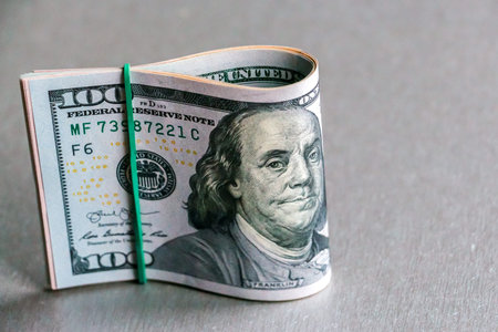 Closeup view of one hundred dollar banknotes.