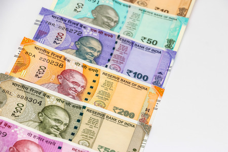 Close up view of brand new indian 10, 50, 100, 200, 500 and 2000 rupees banknotes. Colorful money background.の写真素材