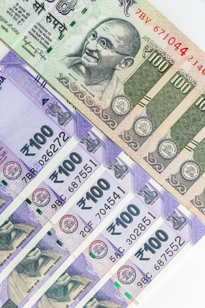Close up view of brand new indian 100 rupees banknotes.