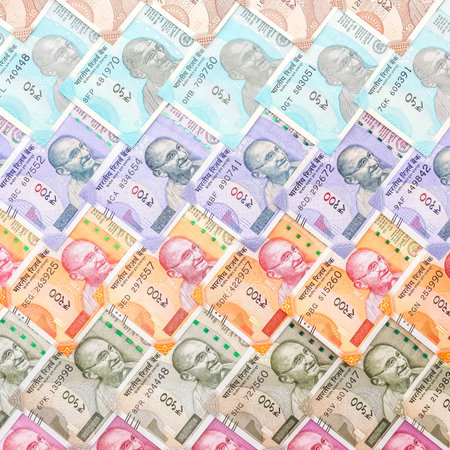 Close up view of brand new indian 10, 50, 100, 200, 500 and 2000 rupees banknotes. Colorful cash...