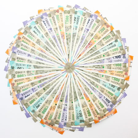 Close up view of brand new indian 50, 100, 200, 500 rupees banknotes. Colorful money ornamental background.の写真素材