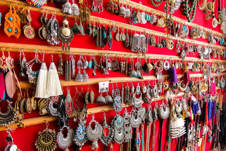 Rishikesh, India - Circa April 2018. Earrings in souvenir shop on the street of Rishikesh.のeditorial素材