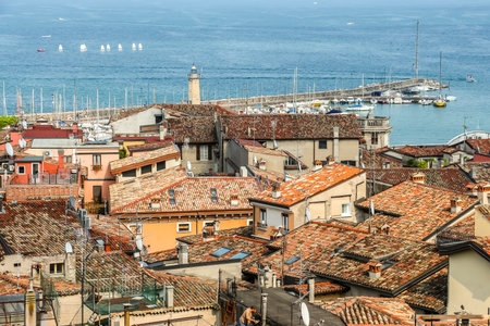 Desenzano del Garda, Italy - Circa September 2018. Sunny day in small town Desenzano, located on Garda lake.のeditorial素材
