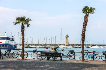 Desenzano del Garda, Italy - Circa September 2018. Sunny day in small town Desenzano, located on Garda lake.のeditorial素材