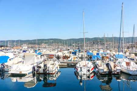 Trieste, Italy - Circa August 2018. Sunny day in harbor. View of yachts moored in Trieste.のeditorial素材
