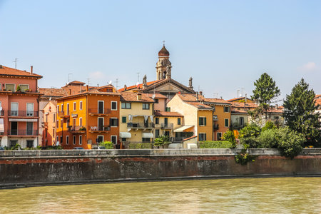 Verona, Italy - Circa September 2018. View of Adige river embankment in sunny day.のeditorial素材