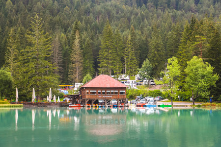 Lago di Dobbiaco, Italy - Circa August 2018. Beautiful view of Lago di Dobbiaco - lake in italian mountains.のeditorial素材