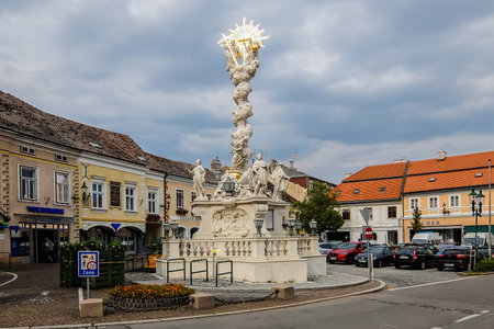 Modling, Lower Austria, Austria - Circa August 2017. Monument near the parish church of St. Othmar.のeditorial素材