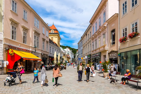 Linz, Austria - August 12, 2017. View of the street with walking people on the Main Square Hauptplatz.のeditorial素材