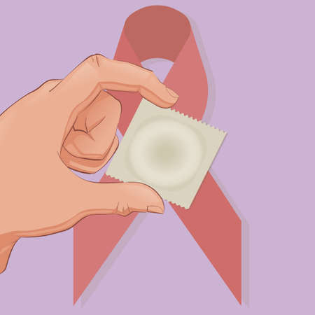 Take Care Be Safe Aids Day hand with condomの写真素材