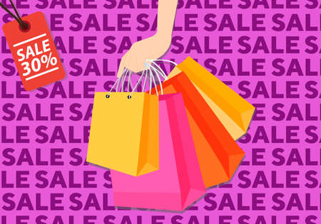 Sale shopping with hand holding shop bags on sale patternの写真素材