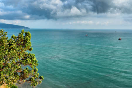 Black Sea. Panorama from the warm and sunny coast of the Krasnodar Territory. Nature and turquoise waters.の写真素材