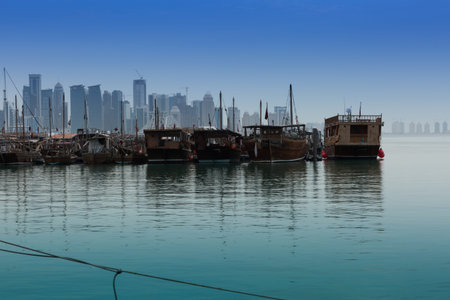 Fishing boats awaiting the start of a working day, the port in Doha, Qatar